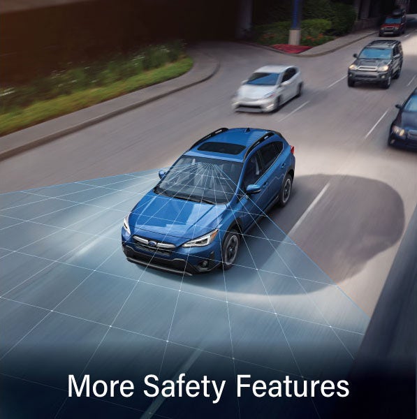 A Subaru Crosstrek in blue with the words &ldquo;More Safety Features&ldquo;. | Subaru City of Milwaukee in Milwaukee WI