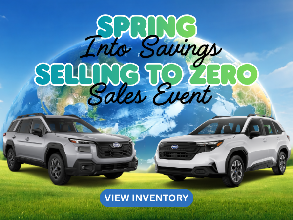 Subaru Spring Sales Event with SUVs and globe backdrop
